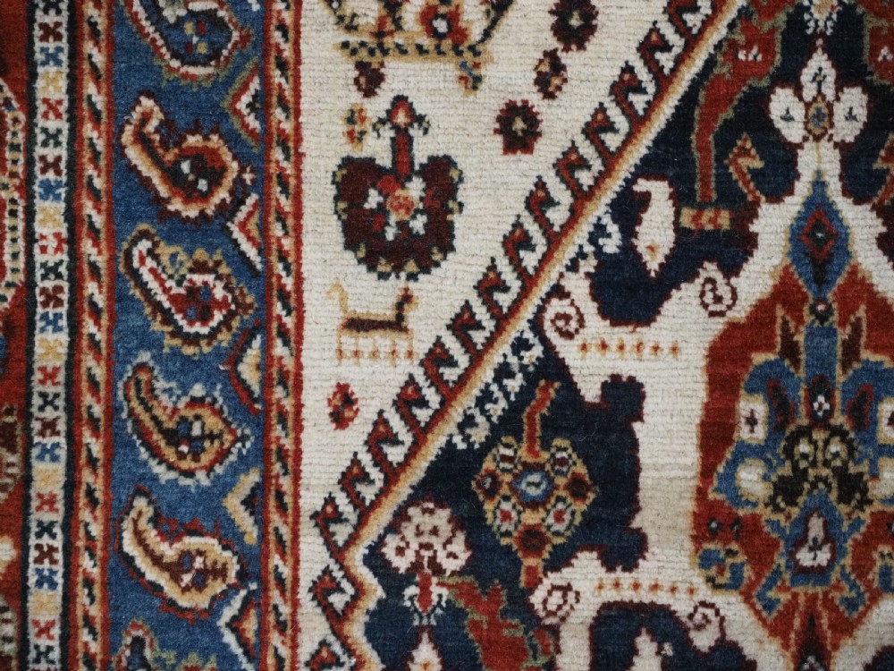ANTIQUE QASHQAI KASHKULI RUG WITH REPEAT MEDALLION DESIGN, CIRCA 1900. View XIII