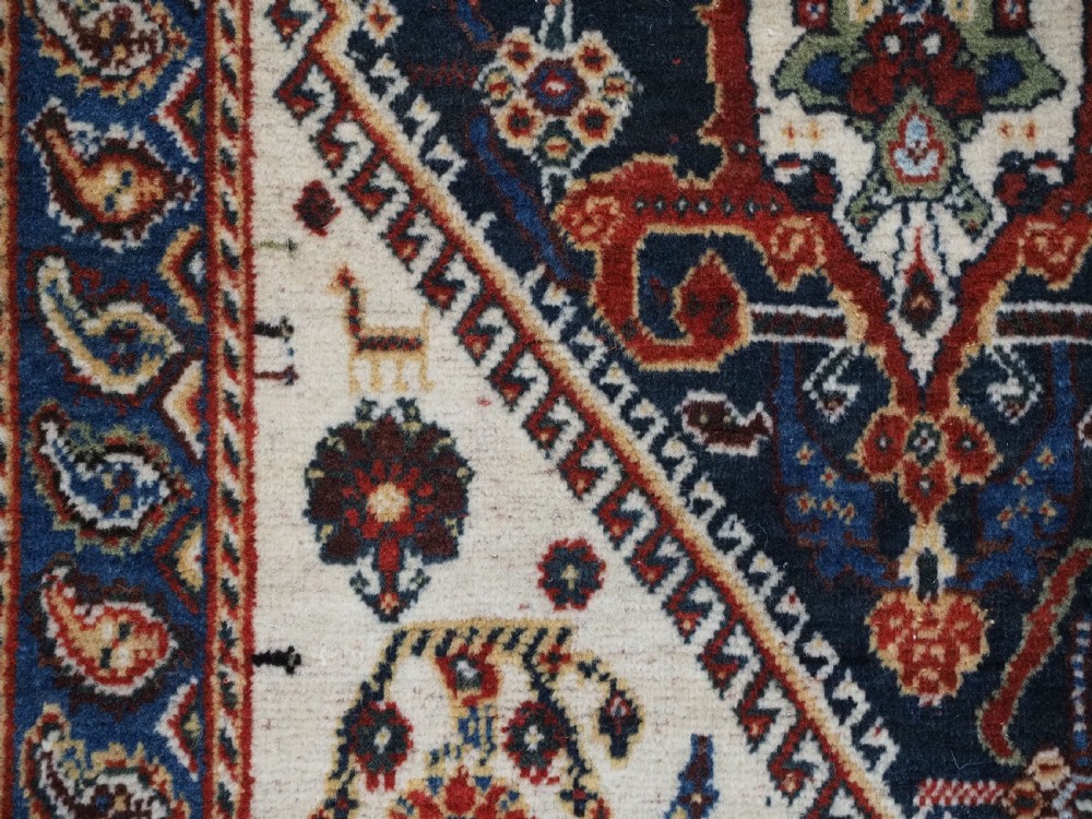 ANTIQUE QASHQAI KASHKULI RUG WITH REPEAT MEDALLION DESIGN, CIRCA 1900. View XIV