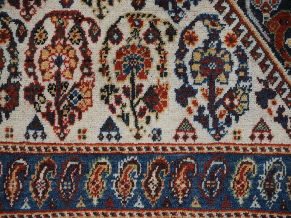 ANTIQUE QASHQAI KASHKULI RUG WITH REPEAT MEDALLION DESIGN, CIRCA 1900. View XV