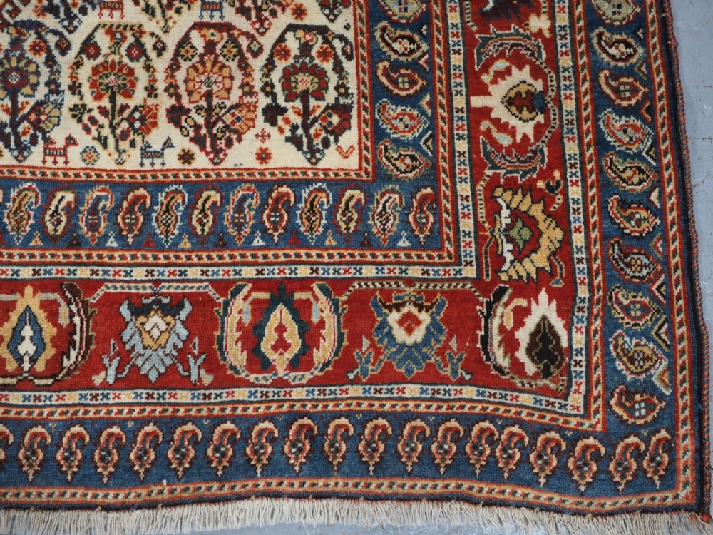 ANTIQUE QASHQAI KASHKULI RUG WITH REPEAT MEDALLION DESIGN, CIRCA 1900. View XVII