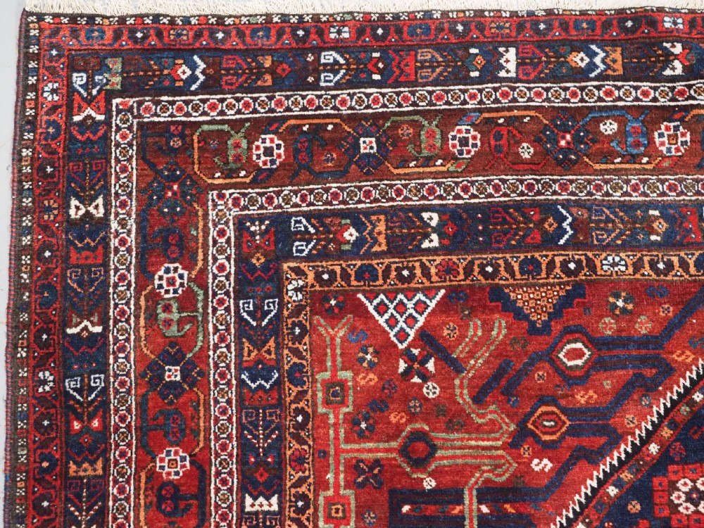 ANTIQUE KHAMSEH RUG WITH LARGE SINGLE MEDALLION, EXCELLENT CONDITION, CIRCA 1900. View VI