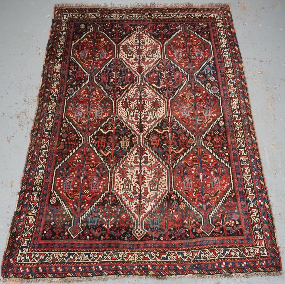 ANTIQUE TRIBAL KHAMSEH RUG WITH BIRD MEDALLION DESIGN, CIRCA 1900.