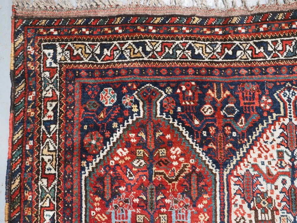 ANTIQUE TRIBAL KHAMSEH RUG WITH BIRD MEDALLION DESIGN, CIRCA 1900. View VI