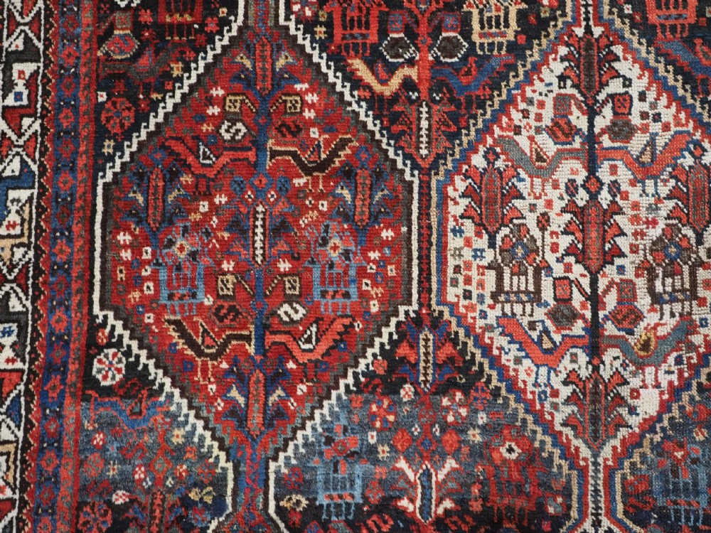 ANTIQUE TRIBAL KHAMSEH RUG WITH BIRD MEDALLION DESIGN, CIRCA 1900. View X