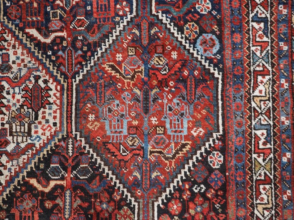 ANTIQUE TRIBAL KHAMSEH RUG WITH BIRD MEDALLION DESIGN, CIRCA 1900. View XI