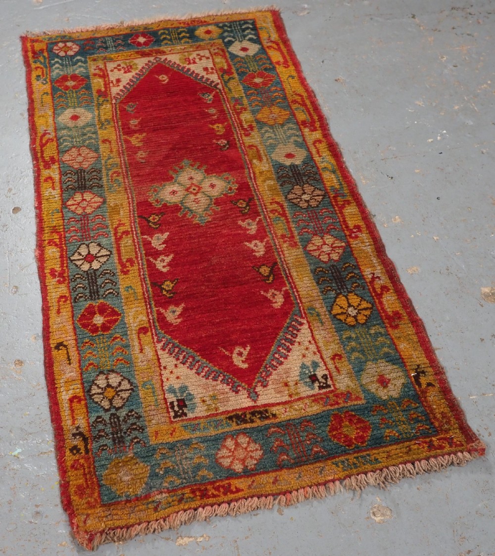 ANTIQUE TURKISH OUSHAK RUG, SMALL SIZE WITH SUPERB COLOUR, CIRCA 1900. View II