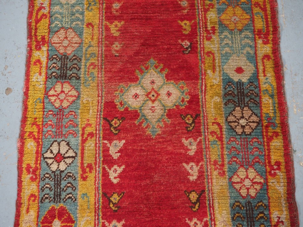 ANTIQUE TURKISH OUSHAK RUG, SMALL SIZE WITH SUPERB COLOUR, CIRCA 1900. View IV