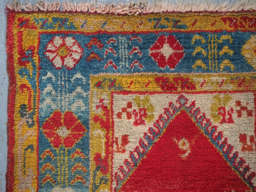 ANTIQUE TURKISH OUSHAK RUG, SMALL SIZE WITH SUPERB COLOUR, CIRCA 1900. View VI