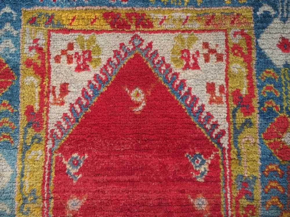 ANTIQUE TURKISH OUSHAK RUG, SMALL SIZE WITH SUPERB COLOUR, CIRCA 1900. View VIII