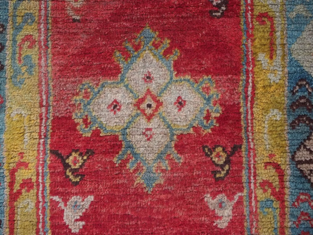 ANTIQUE TURKISH OUSHAK RUG, SMALL SIZE WITH SUPERB COLOUR, CIRCA 1900. View IX