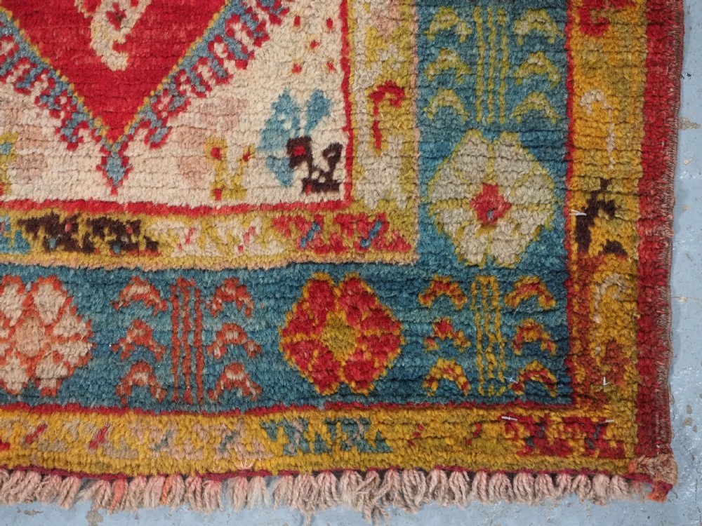 ANTIQUE TURKISH OUSHAK RUG, SMALL SIZE WITH SUPERB COLOUR, CIRCA 1900. View XI