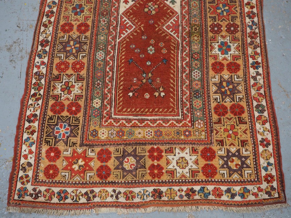 ANTIQUE TURKISH MILAS PRAYER RUG, STAR & ROSETTE BORDER, CIRCA 1800-1825. View V