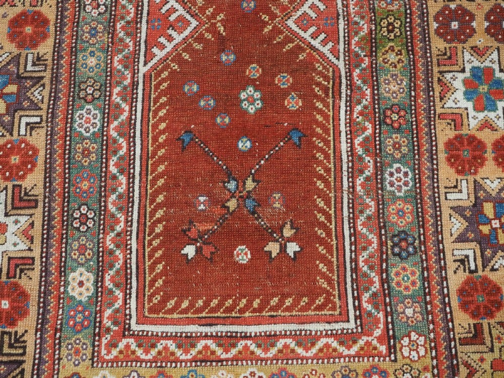 ANTIQUE TURKISH MILAS PRAYER RUG, STAR & ROSETTE BORDER, CIRCA 1800-1825. View X