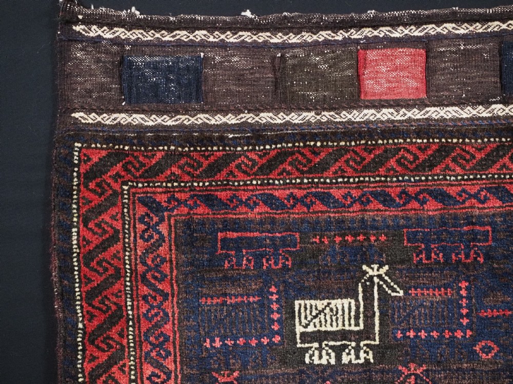 ANTIQUE BALUCH SADDLEBAG FACE WITH BIRD / COCKEREL DESIGN, CIRCA 1900. View II
