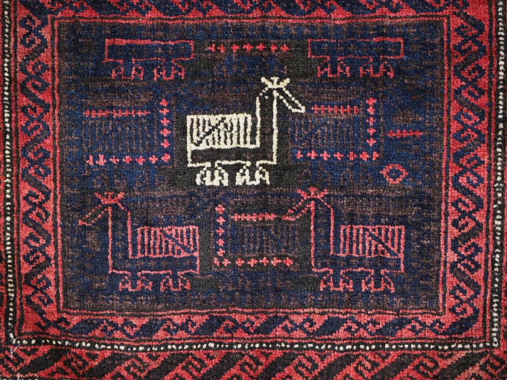 ANTIQUE BALUCH SADDLEBAG FACE WITH BIRD / COCKEREL DESIGN, CIRCA 1900. View VI