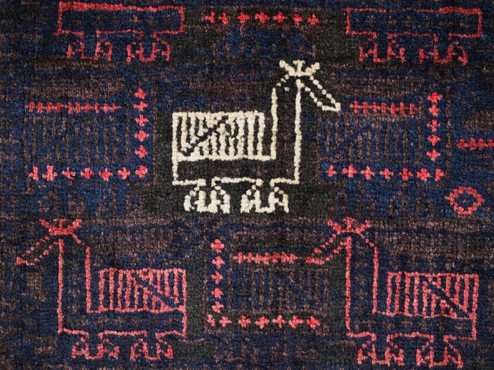 ANTIQUE BALUCH SADDLEBAG FACE WITH BIRD / COCKEREL DESIGN, CIRCA 1900. View VII