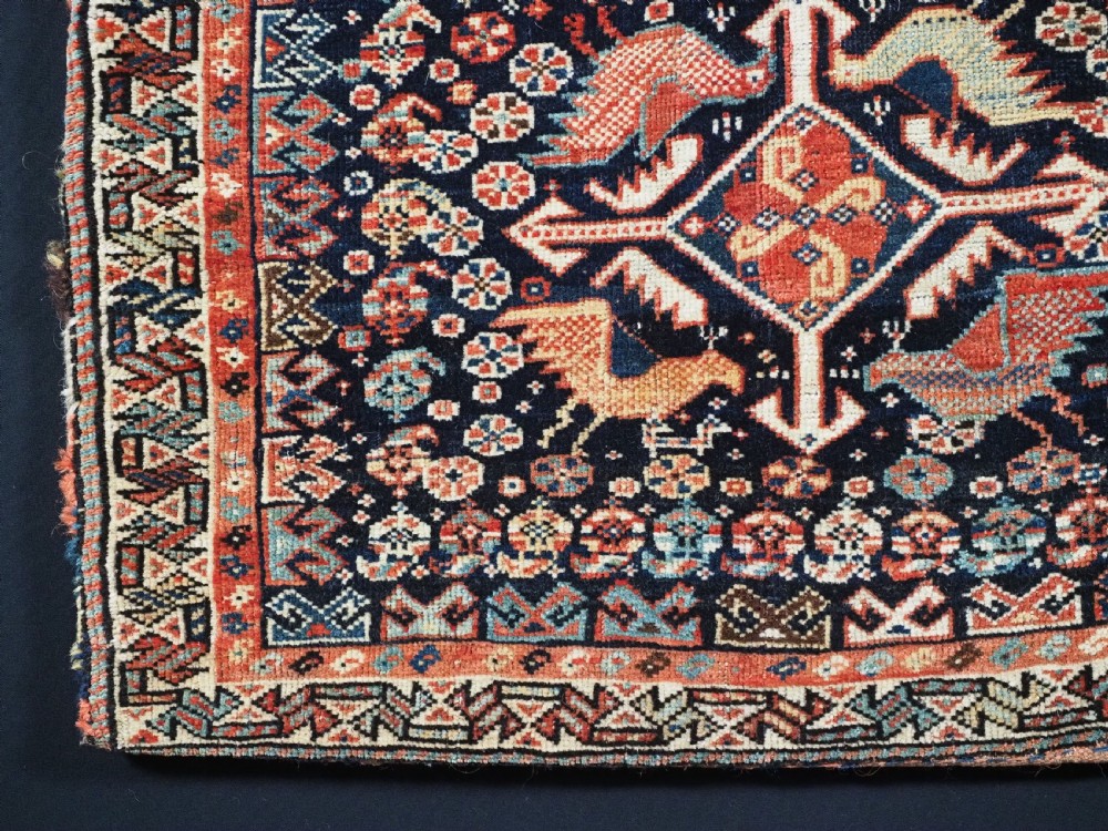 ANTIQUE KHAMSEH TRIBAL SADDLEBAG WITH SOUGHT AFTER BIRD DESIGN, CIRCA 1880. View IV