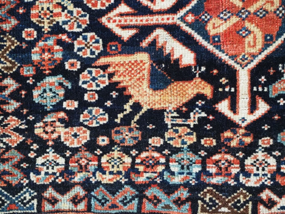 ANTIQUE KHAMSEH TRIBAL SADDLEBAG WITH SOUGHT AFTER BIRD DESIGN, CIRCA 1880. View VII