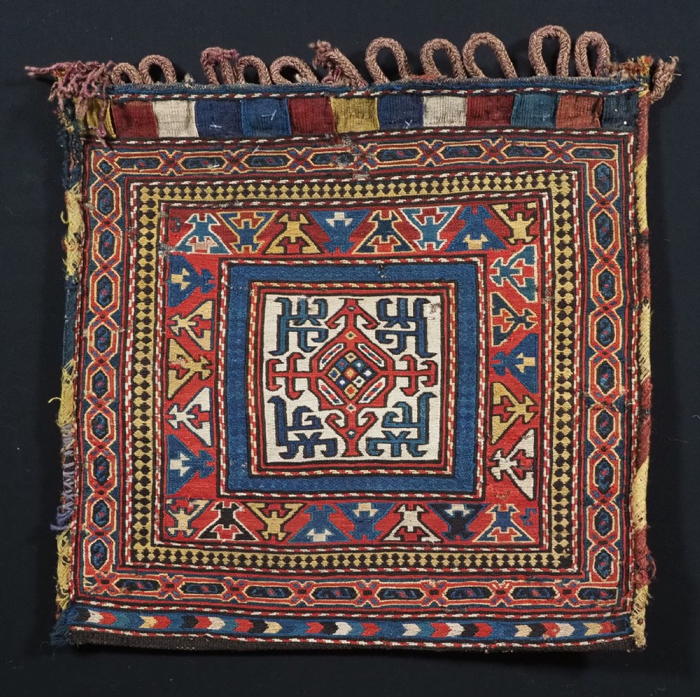 ANTIQUE SHAHSAVAN SOUMAK SADDLEBAG WITH ORIGINAL BACK, CIRCA 1880.