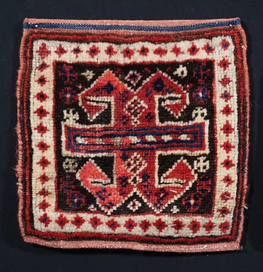 A PAIR OF ANTIQUE SHAHSAVAN MINIATURE BAGS WITH BACKS OPENED FOR DISPLAY, CIRCA 1880. View III