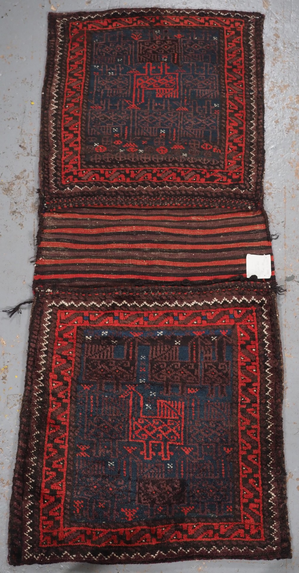 ANTIQUE PAIR OF BALUCH SADDLEBAGS WITH BIRD DESIGN, CIRCA 1900/20.