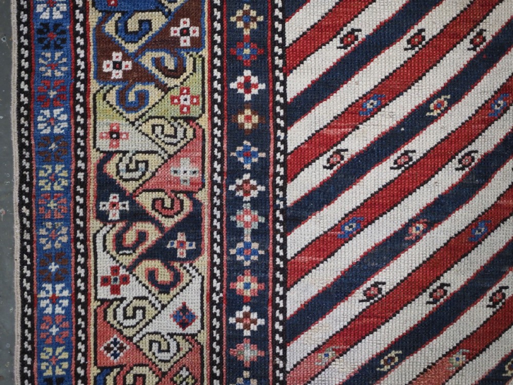 ANTIQUE CAUCASIAN SHIRVAN OR DAGESTAN PRAYER RUG OF SCARCE DIAGONAL STRIPE DESIGN, CIRCA 1850. View VI