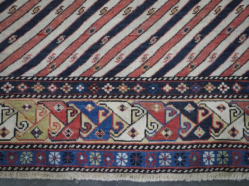 ANTIQUE CAUCASIAN SHIRVAN OR DAGESTAN PRAYER RUG OF SCARCE DIAGONAL STRIPE DESIGN, CIRCA 1850. View X