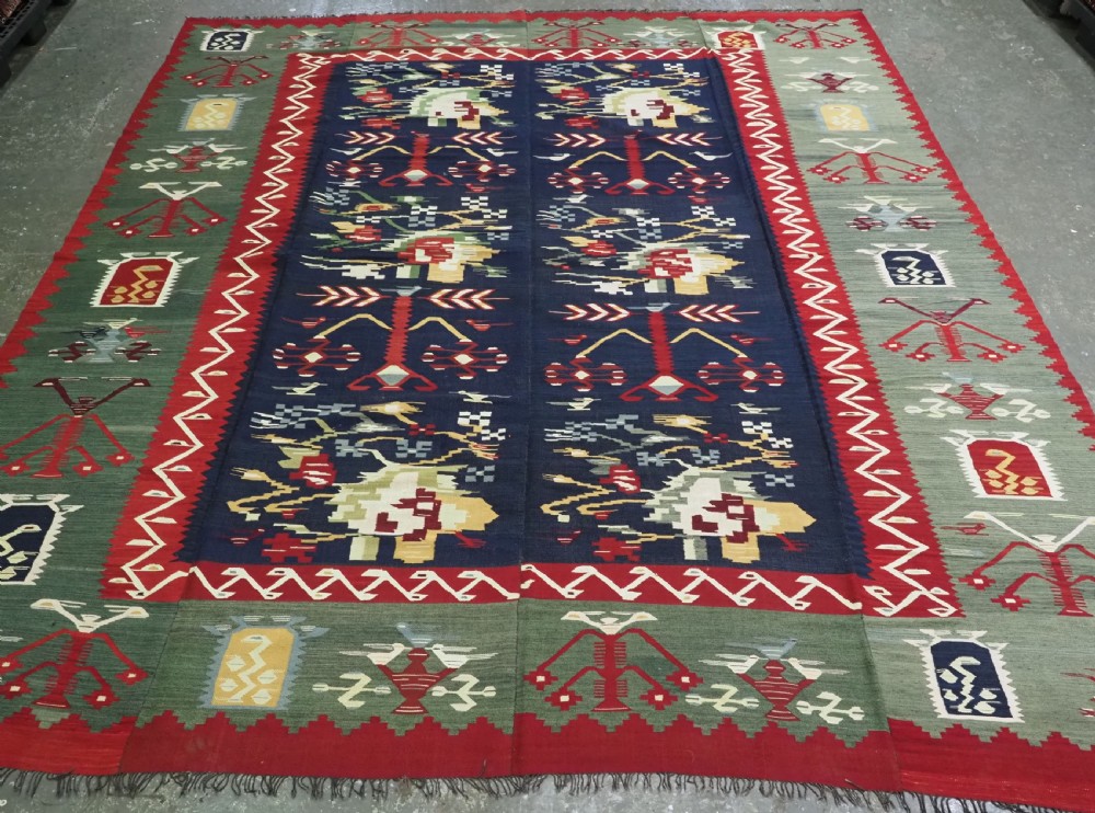 RARE ANTIQUE PIROT / SARKOY KILIM OF OUTSTANDING DESIGN, WOVEN IN 4 PARTS CIRCA 1900.