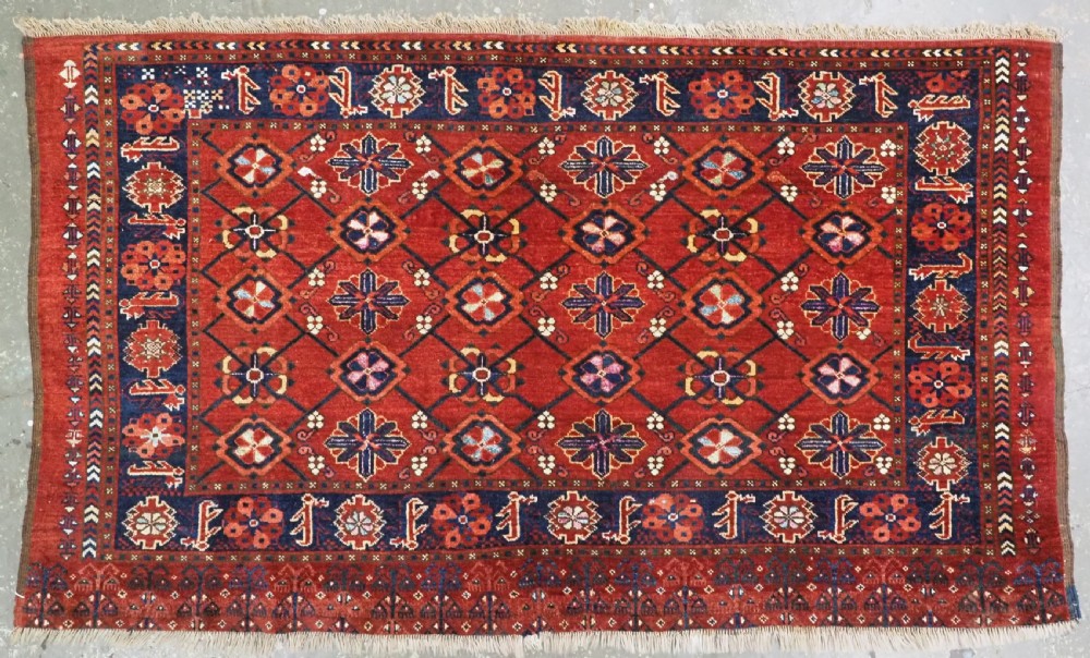 ANTIQUE BESHIR TURKMEN CHUVAL WITH MINA KHANI DESIGN, SILK HIGHLIGHTS, CIRCA 1890.