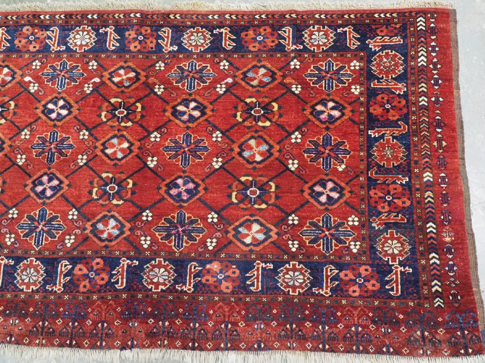ANTIQUE BESHIR TURKMEN CHUVAL WITH MINA KHANI DESIGN, SILK HIGHLIGHTS, CIRCA 1890. View IV