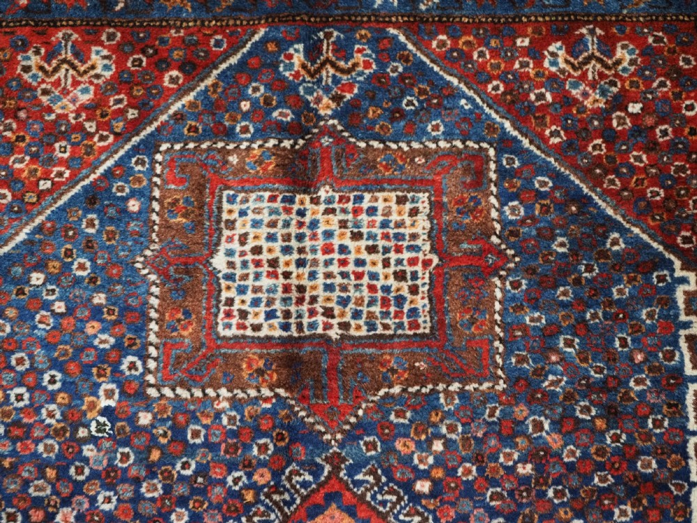 ANTIQUE SHIRAZ KHAMSEH TRIBAL RUG, OUTSTANDING CONDITION, CIRCA 1920. View VIII