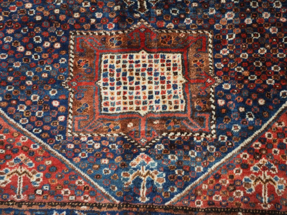 ANTIQUE SHIRAZ KHAMSEH TRIBAL RUG, OUTSTANDING CONDITION, CIRCA 1920. View X