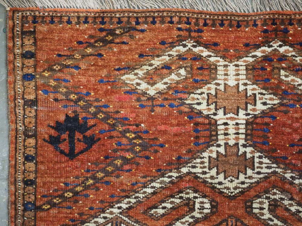 ANTIQUE AFGHAN TURKMEN PRAYER RUG WITH RAMS HORN DESIGN, CIRCA 1900. View V