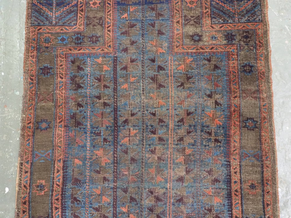 ANTIQUE BALUCH OR TIMURI BLUE GROUND PRAYER RUG, CIRCA 1880. View IV
