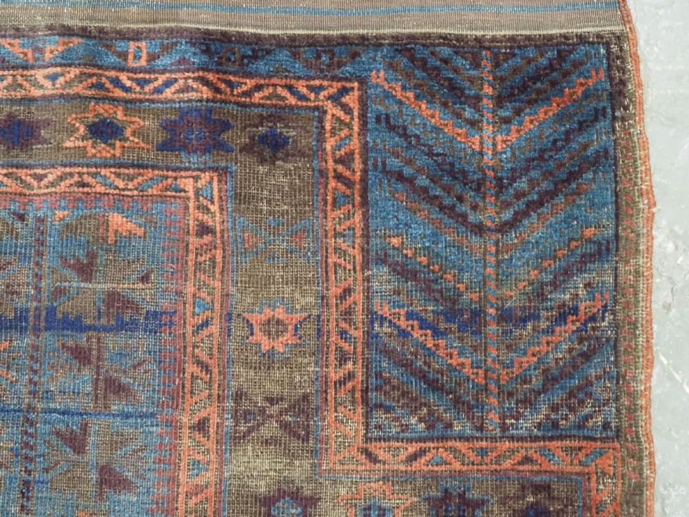 ANTIQUE BALUCH OR TIMURI BLUE GROUND PRAYER RUG, CIRCA 1880. View VIII