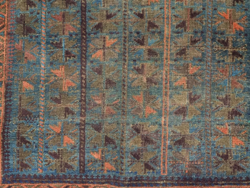 ANTIQUE BALUCH OR TIMURI BLUE GROUND PRAYER RUG, CIRCA 1880. View X