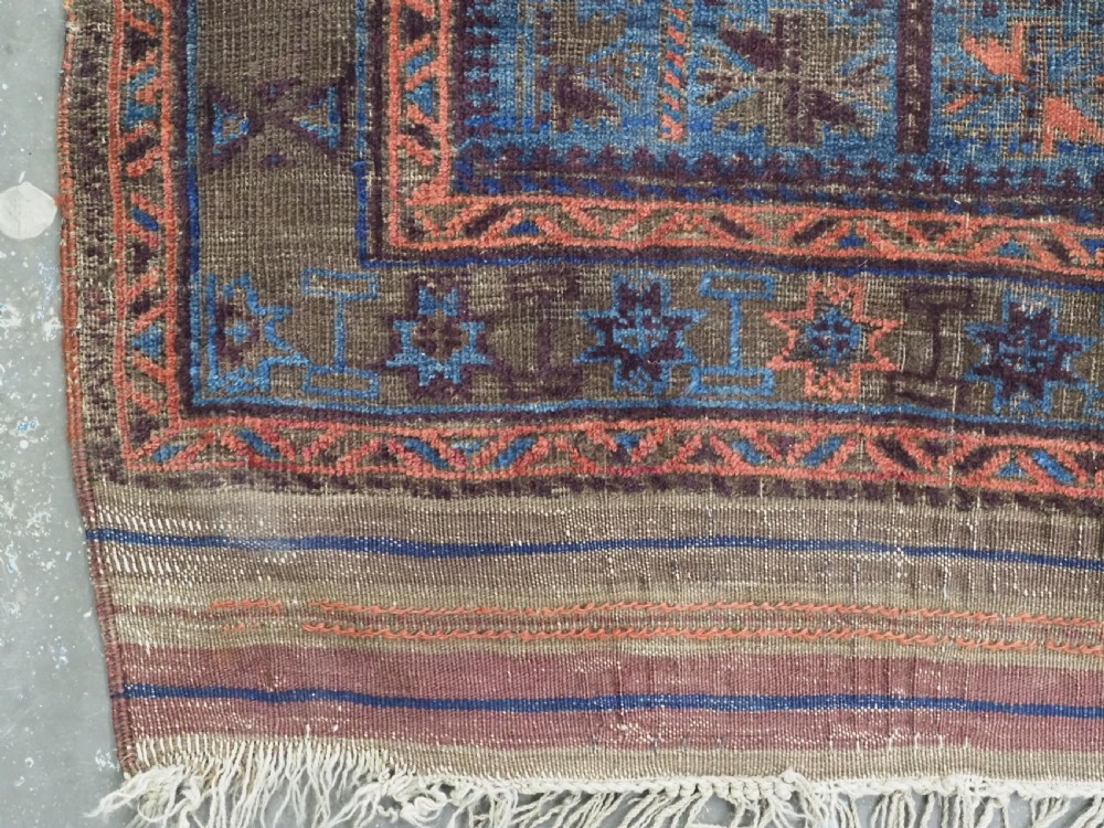 ANTIQUE BALUCH OR TIMURI BLUE GROUND PRAYER RUG, CIRCA 1880. View XII