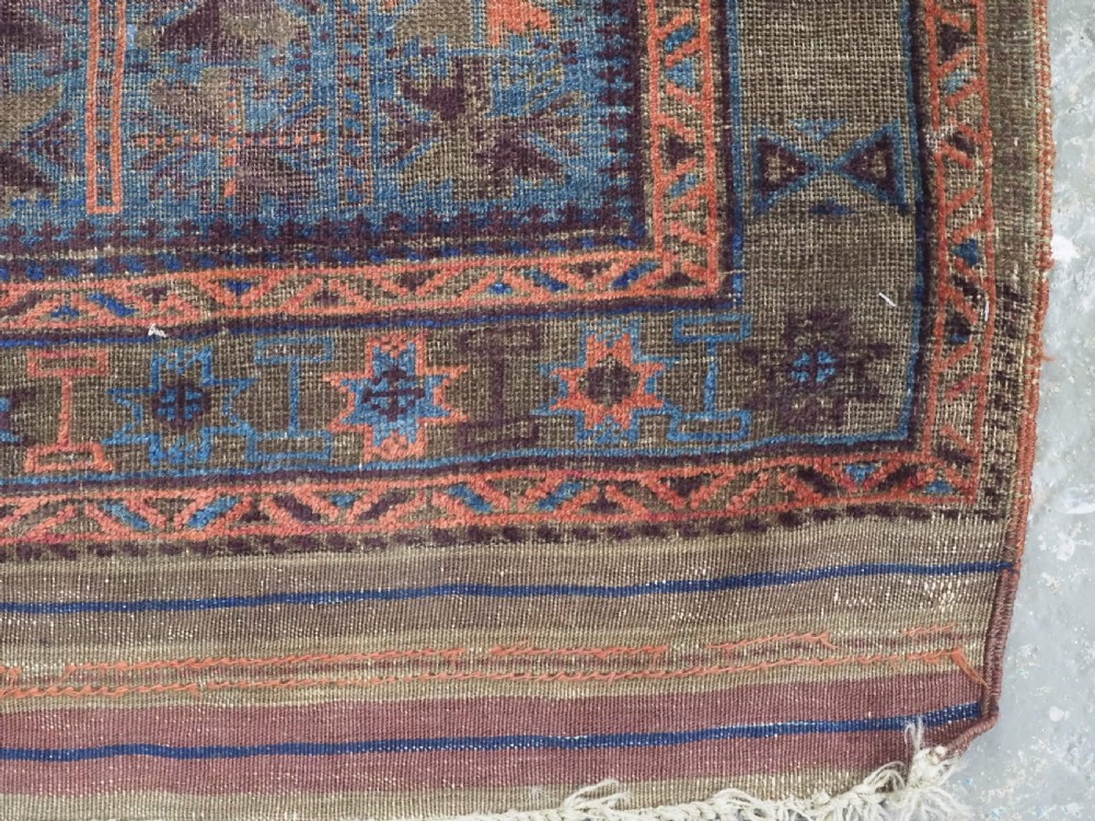 ANTIQUE BALUCH OR TIMURI BLUE GROUND PRAYER RUG, CIRCA 1880. View XIII