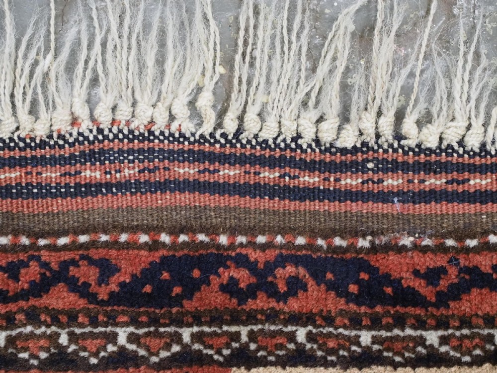 An antique hand-knotted Baluch prayer rug featuring a camel-coloured ground, central tree of life motif, mihrab arch, and decorative geometric borders. View XII