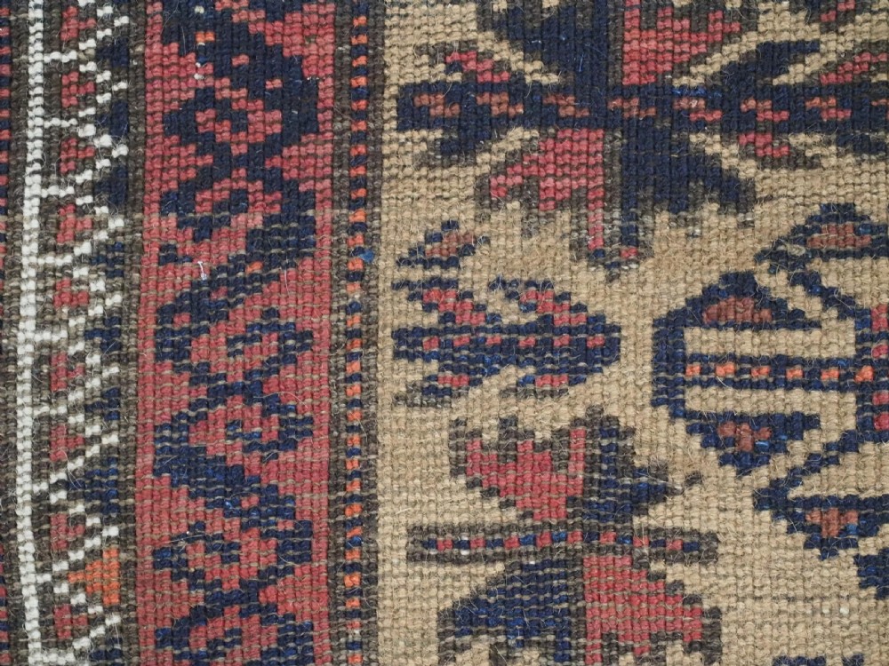 An antique hand-knotted Baluch prayer rug featuring a camel-coloured ground, central tree of life motif, mihrab arch, and decorative geometric borders. View XIII