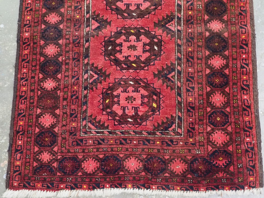 ANTIQUE AFGHAN KIZIL AYAK TURKMEN PRAYER RUG WITH RAMS HORNS, CIRCA 1900. View IV