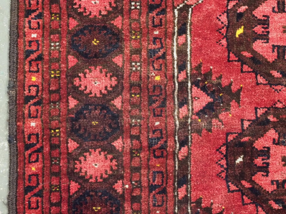 ANTIQUE AFGHAN KIZIL AYAK TURKMEN PRAYER RUG WITH RAMS HORNS, CIRCA 1900. View VI