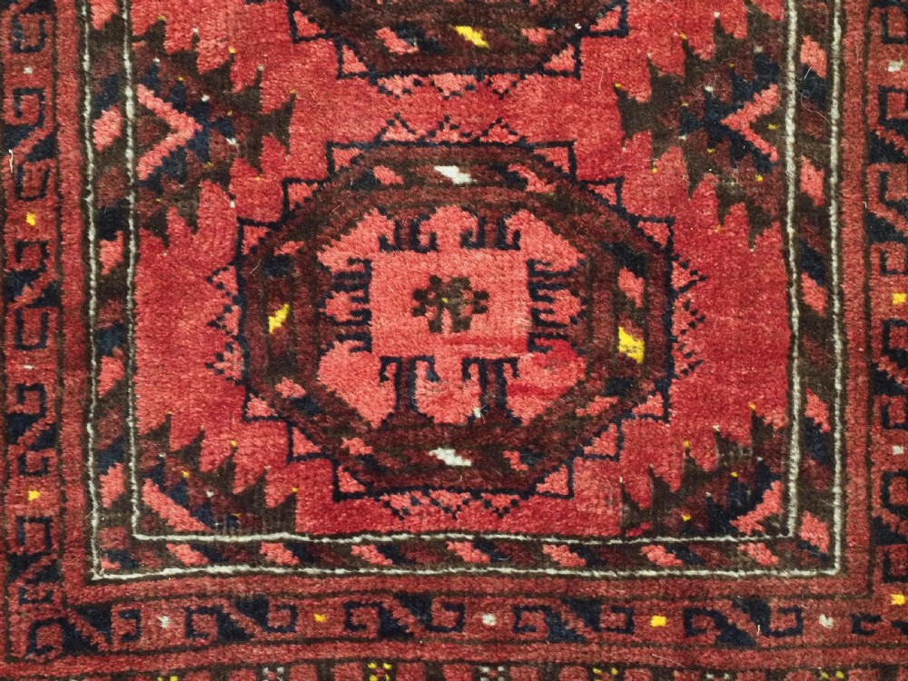 ANTIQUE AFGHAN KIZIL AYAK TURKMEN PRAYER RUG WITH RAMS HORNS, CIRCA 1900. View VIII