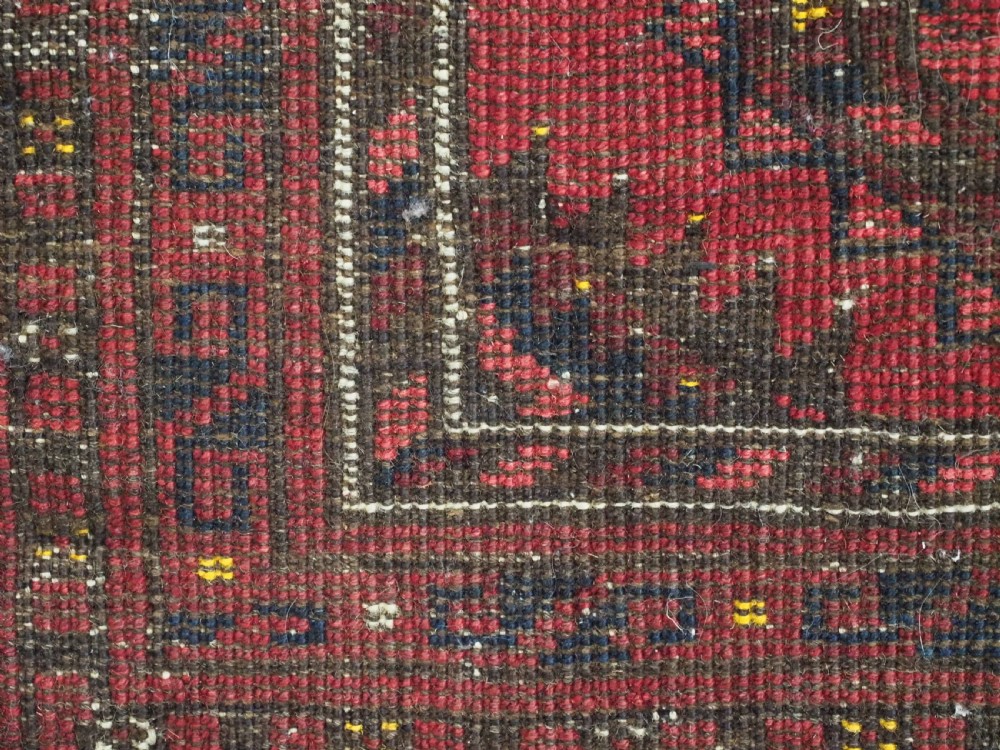 ANTIQUE AFGHAN KIZIL AYAK TURKMEN PRAYER RUG WITH RAMS HORNS, CIRCA 1900. View X
