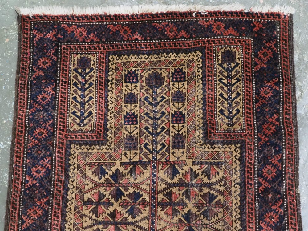 ANTIQUE BALUCH (TIMURI) PRAYER RUG, CAMEL GROUND WITH TREE OF LIFE, CIRCA 1900. View III