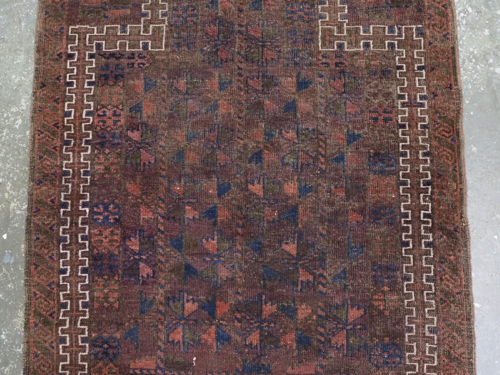 ANTIQUE BALUCH PRAYER RUG, WESTERN AFGHANISTAN, REPEAT LEAF DESIGN, CIRCA 1900. View III