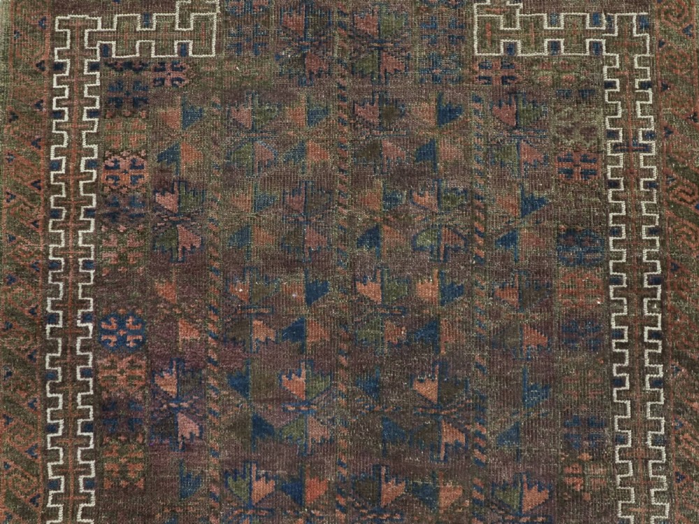 ANTIQUE BALUCH PRAYER RUG, WESTERN AFGHANISTAN, REPEAT LEAF DESIGN, CIRCA 1900. View VIII
