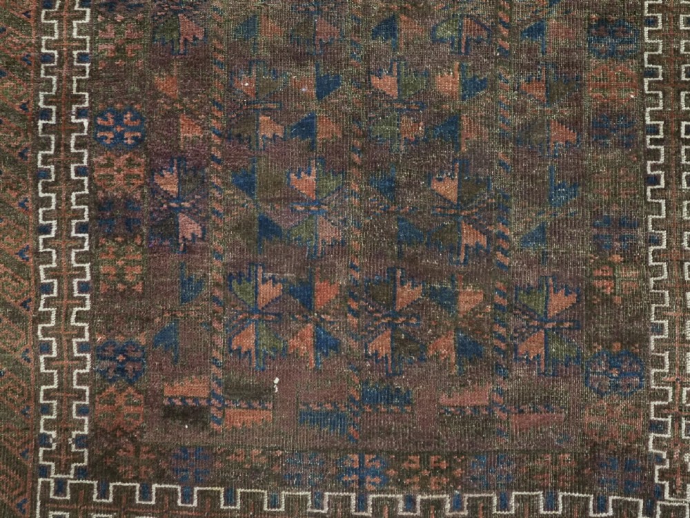 ANTIQUE BALUCH PRAYER RUG, WESTERN AFGHANISTAN, REPEAT LEAF DESIGN, CIRCA 1900. View IX