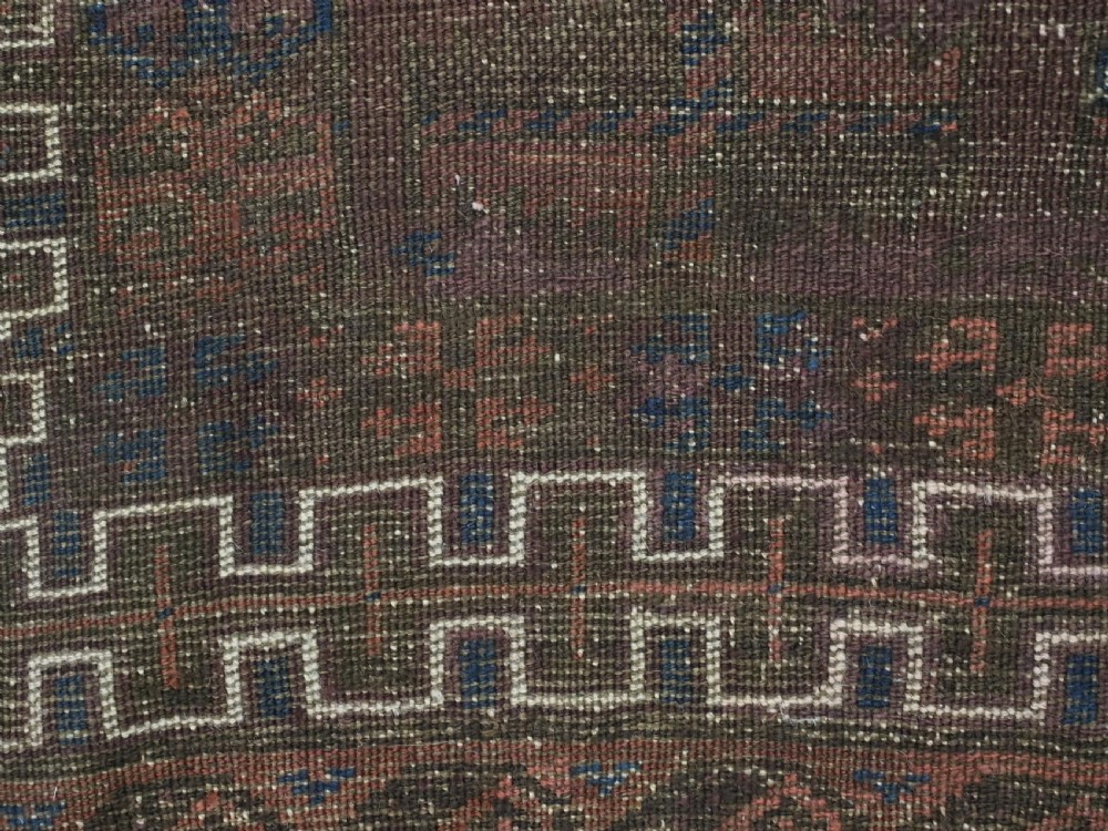 ANTIQUE BALUCH PRAYER RUG, WESTERN AFGHANISTAN, REPEAT LEAF DESIGN, CIRCA 1900. View XI