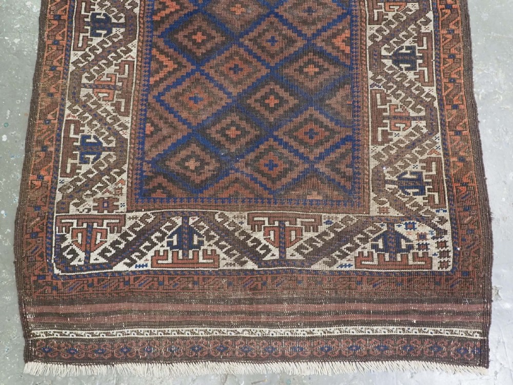 ANTIQUE TIMURI OR BALUCH RUG, LARGE IVORY BORDER, CIRCA 1880. View V